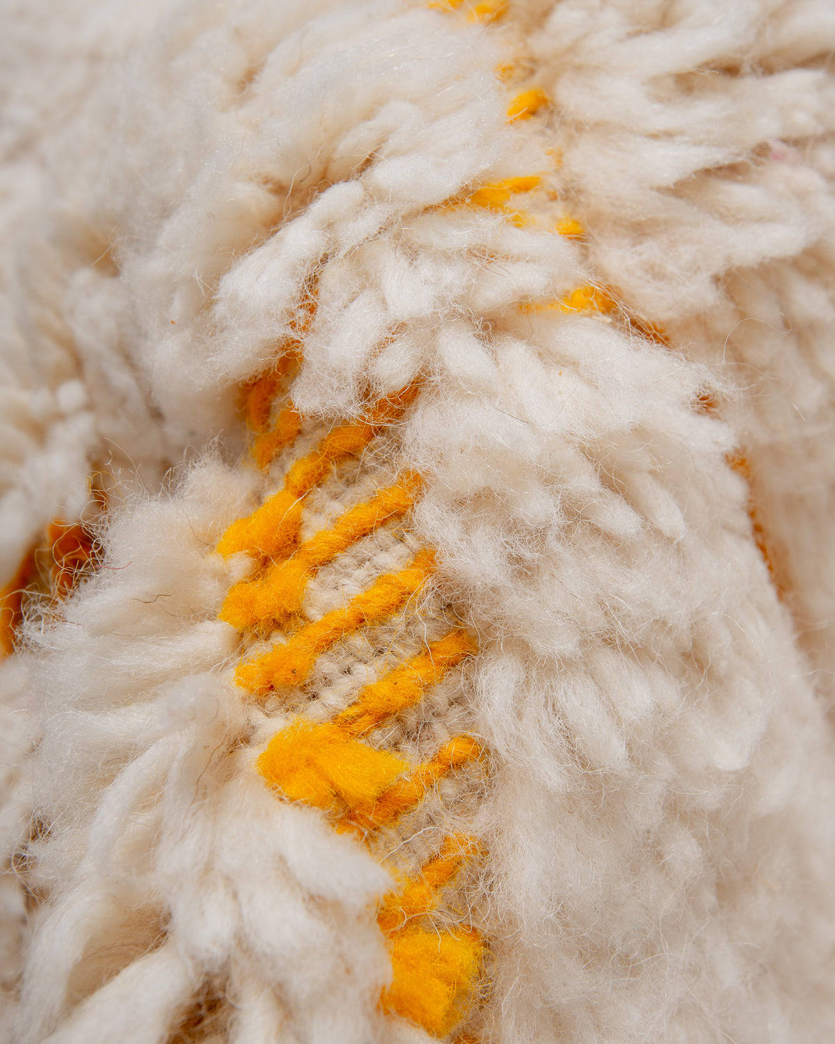 Modern, designer, handcrafted Berber rug from Morocco. Beniourain carpet with beautiful colours and patterns and fluffy wool texture.
